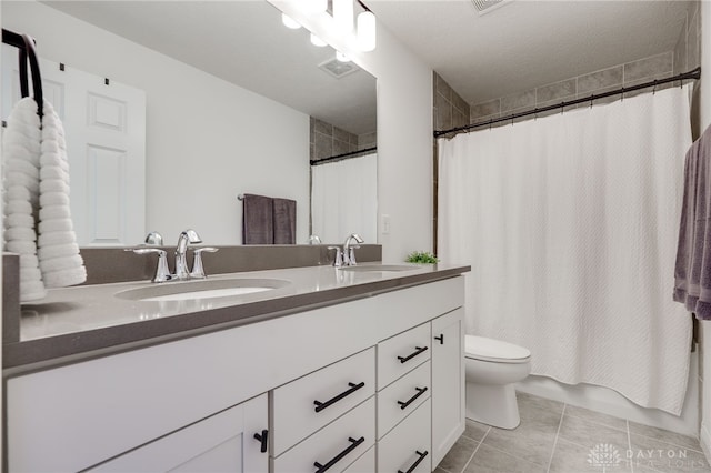 598 Twilight Ln, Dayton, OH 45440 - bathroom featuring double vanity and tile patterned flooring