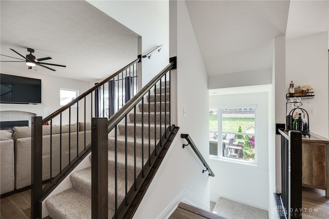 598 Twilight Ln, Dayton, OH 45440 - stairway with healthy amount of natural light, wood finished floors, and a ceiling fan