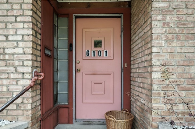 6101 Capri Dr, Cincinnati, OH 45224 - doorway to property featuring brick siding