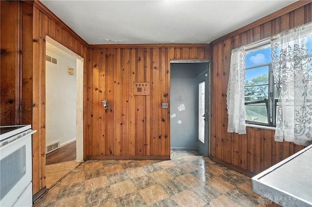 6101 Capri Dr, Cincinnati, OH 45224 - foyer featuring stone finish flooring and wooden walls
