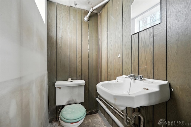 6101 Capri Dr, Cincinnati, OH 45224 - half bath with wood walls and toilet