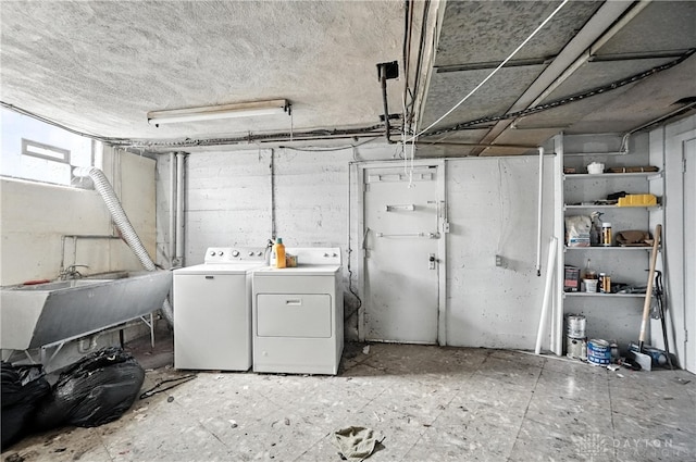 6101 Capri Dr, Cincinnati, OH 45224 - basement featuring a sink and separate washer and dryer