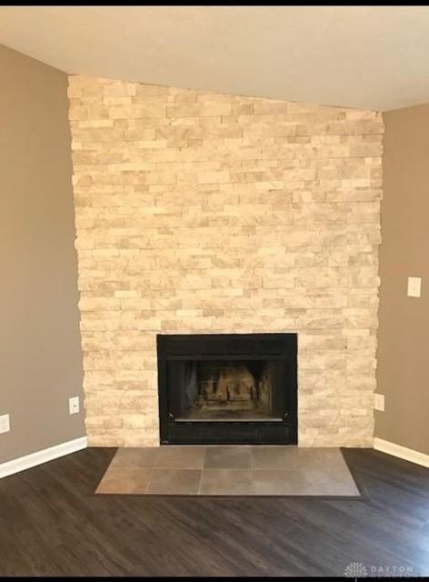 1411 Lake Pointe Way Unit 8, Washington Twp, OH 45459 - detailed view of a stone fireplace and wood finished floors