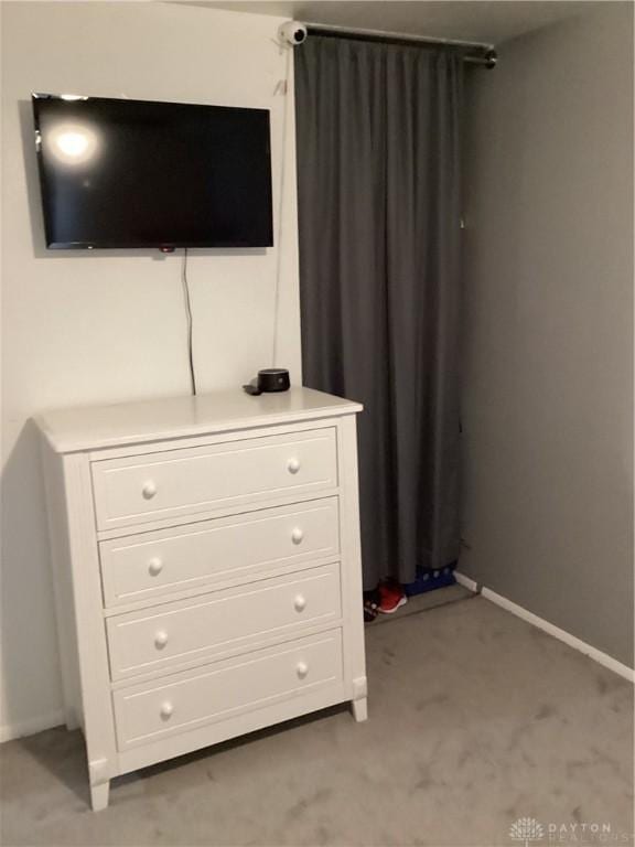 150 Lexington Farm Rd, Englewood, OH 45322 - bedroom featuring baseboards and light carpet