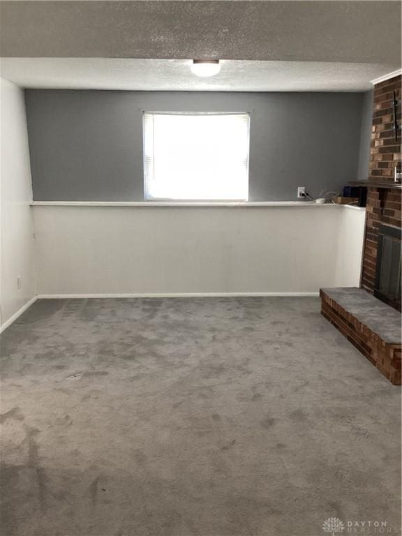 150 Lexington Farm Rd, Englewood, OH 45322 - basement with a brick fireplace and carpet flooring