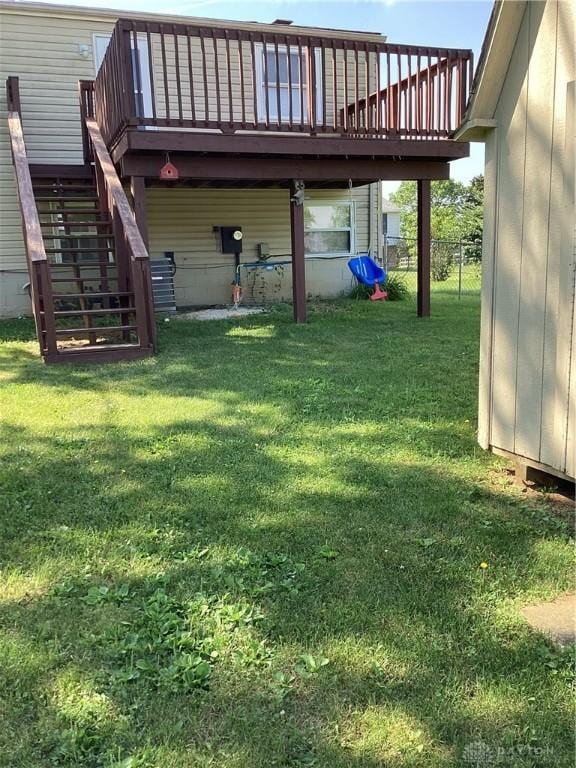 150 Lexington Farm Rd, Englewood, OH 45322 - view of grassy yard with a deck and stairs