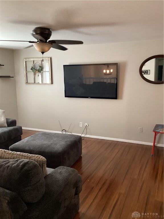 150 Lexington Farm Rd, Englewood, OH 45322 - living room with dark wood-style flooring and ceiling fan
