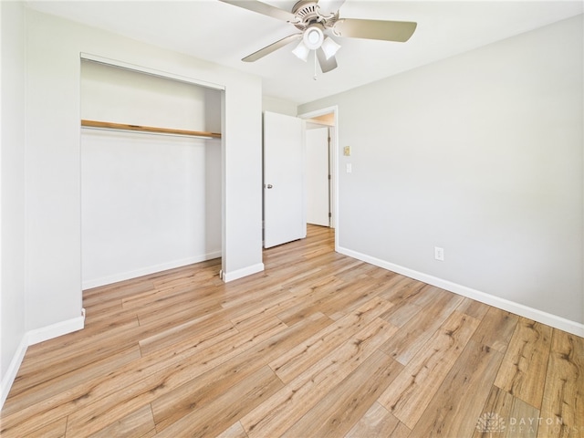 3862 State Route 49, Arcanum, OH 45304 - unfurnished bedroom featuring a closet, wood-type flooring, and a ceiling fan