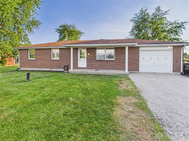3862 State Route 49, Arcanum, OH 45304 - single story home featuring an attached garage, brick siding, a front lawn, and driveway