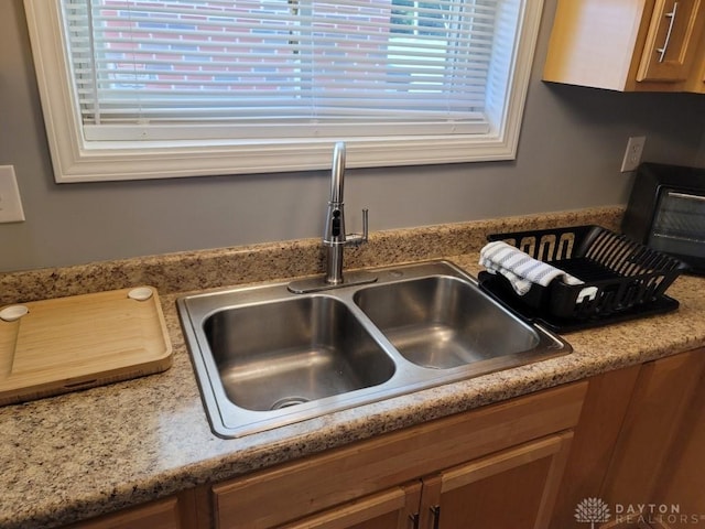 612 E Market St, Xenia, OH 45385 - kitchen view of brown cabinets and light countertops
