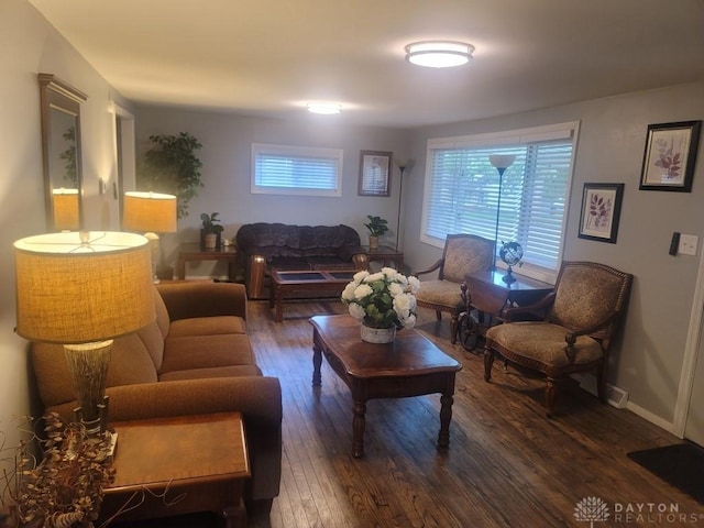 612 E Market St, Xenia, OH 45385 - living room featuring dark wood-style flooring and healthy amount of natural light
