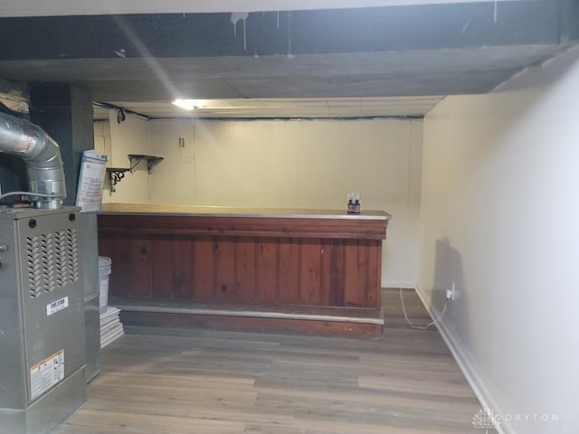 612 E Market St, Xenia, OH 45385 - finished below grade area featuring wood finished floors and heating unit
