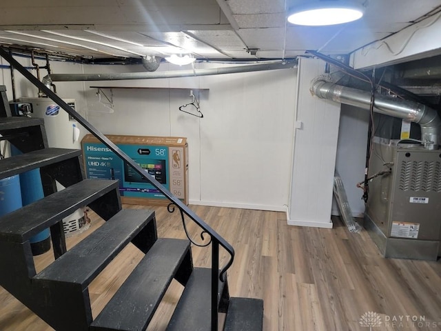612 E Market St, Xenia, OH 45385 - unfinished basement with wood finished floors and stairs