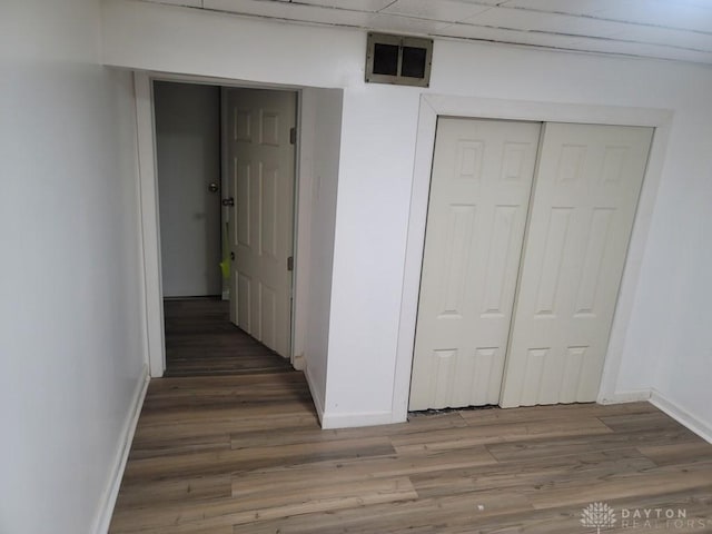 612 E Market St, Xenia, OH 45385 - hallway featuring baseboards and wood finished floors