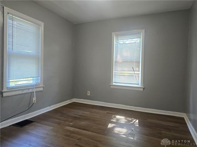 1958 Wesleyan Rd, Dayton, OH 45406 - empty room with dark wood-type flooring and baseboards