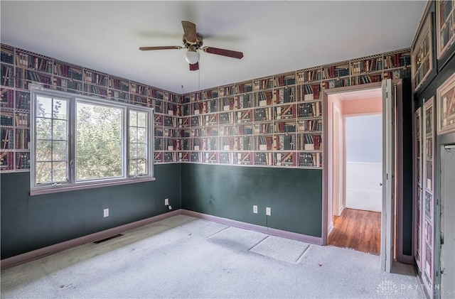 928 E Stroop Rd, Kettering, OH 45429 - carpeted spare room with a ceiling fan and wallpapered walls