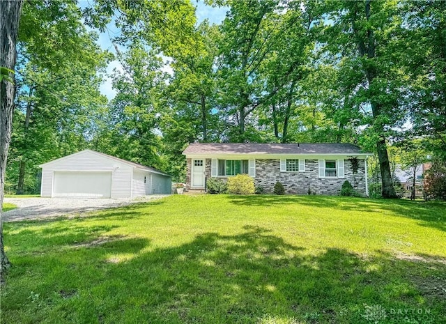 291 Schlitz Dr, Fayetteville, OH 45118 - view of front of home featuring a detached garage, an outdoor structure, a front yard, and stone siding