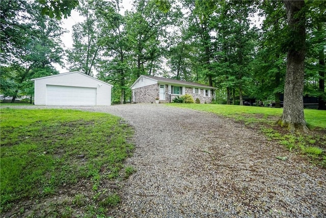 291 Schlitz Dr, Fayetteville, OH 45118 - single story home featuring a garage, an outbuilding, a front lawn, and stone siding