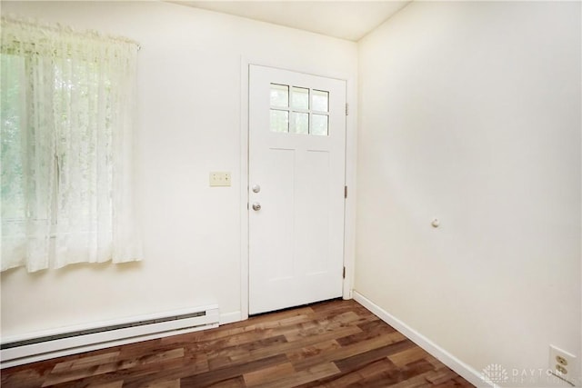 291 Schlitz Dr, Fayetteville, OH 45118 - foyer featuring a baseboard heating unit and wood finished floors