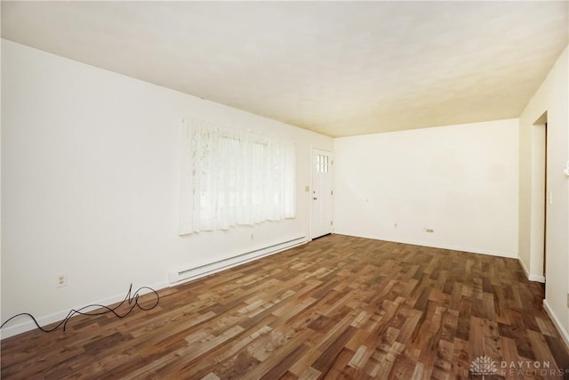 291 Schlitz Dr, Fayetteville, OH 45118 - unfurnished room featuring baseboard heating and wood finished floors