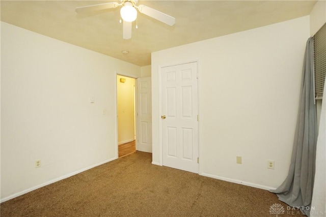 291 Schlitz Dr, Fayetteville, OH 45118 - unfurnished bedroom featuring carpet and a ceiling fan