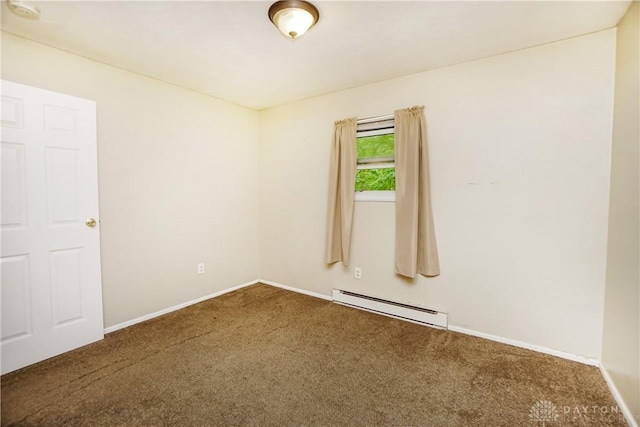 291 Schlitz Dr, Fayetteville, OH 45118 - carpeted spare room featuring a baseboard radiator and a smoke detector