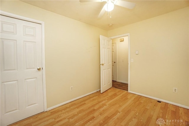 291 Schlitz Dr, Fayetteville, OH 45118 - unfurnished room featuring light wood finished floors and a ceiling fan
