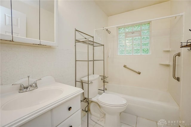 291 Schlitz Dr, Fayetteville, OH 45118 - bathroom featuring bathing tub / shower combination, vanity, tile walls, and tile patterned floors