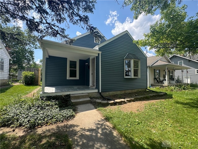 2627 Wayland Ave, Dayton, OH 45420 - bungalow featuring a porch and a front lawn