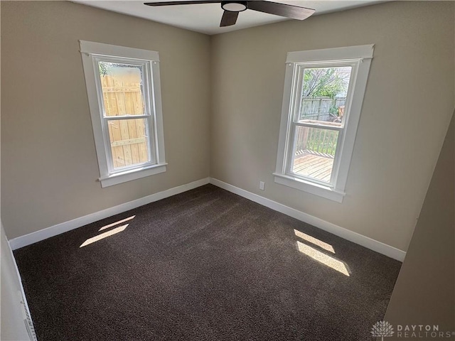 2627 Wayland Ave, Dayton, OH 45420 - empty room featuring a ceiling fan and dark carpet