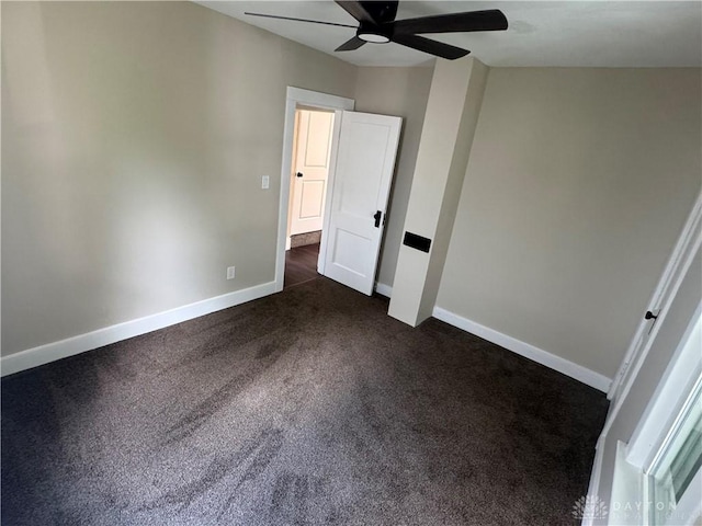 2627 Wayland Ave, Dayton, OH 45420 - unfurnished bedroom with dark carpet and a ceiling fan