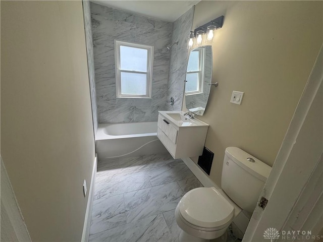 2627 Wayland Ave, Dayton, OH 45420 - full bath featuring marble look tiles, vanity, and bathtub / shower combination