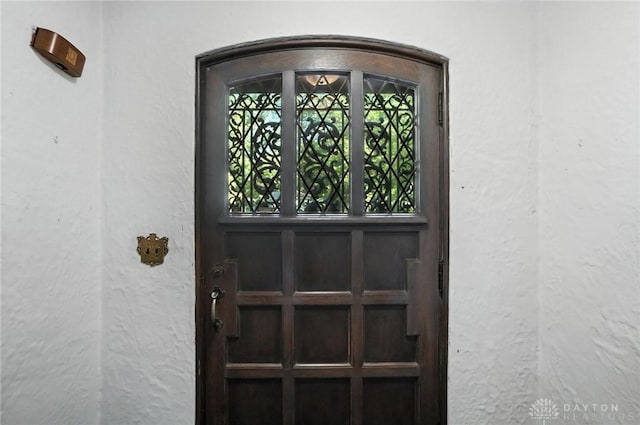 715 E Schantz Ave, Oakwood, OH 45419 - doorway to property featuring stucco siding