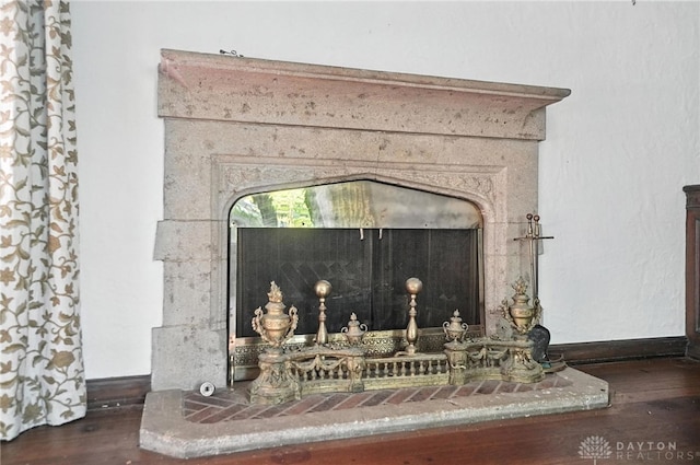 715 E Schantz Ave, Oakwood, OH 45419 - detailed view of wood finished floors and a high end fireplace