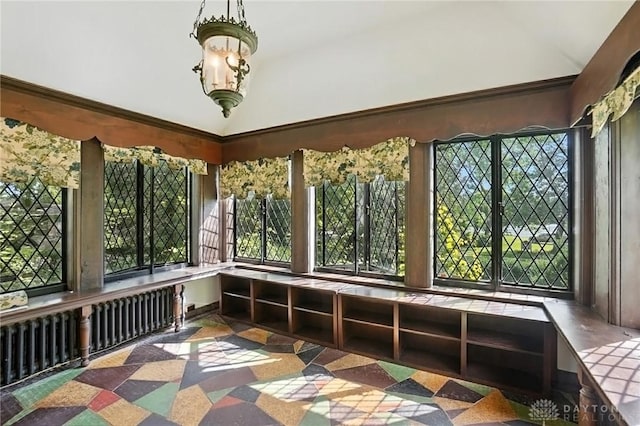715 E Schantz Ave, Oakwood, OH 45419 - unfurnished sunroom with radiator heating unit, french doors, and high vaulted ceiling