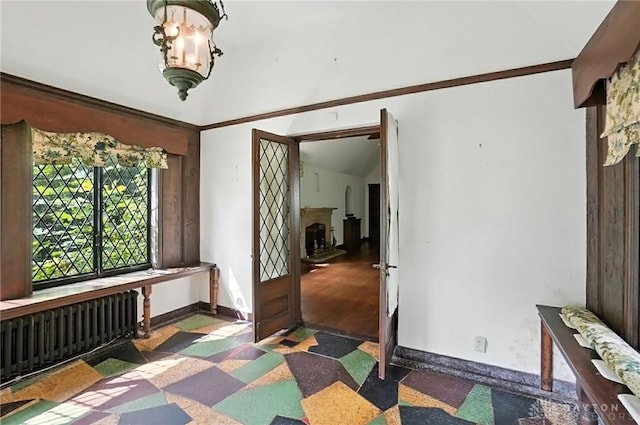 715 E Schantz Ave, Oakwood, OH 45419 - bedroom with radiator heating unit, crown molding, and vaulted ceiling