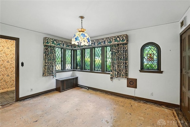 715 E Schantz Ave, Oakwood, OH 45419 - unfurnished dining area with baseboards