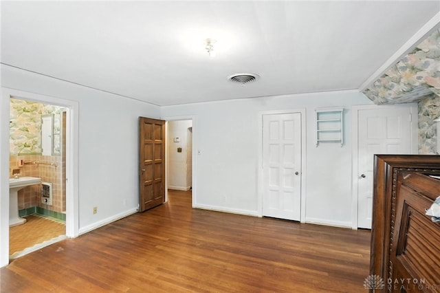 715 E Schantz Ave, Oakwood, OH 45419 - unfurnished living room with wood finished floors and baseboards
