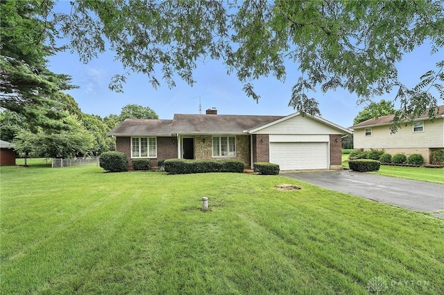 2042 Hilltop Rd, Xenia, OH 45385 - ranch-style house with driveway, a garage, brick siding, and a chimney