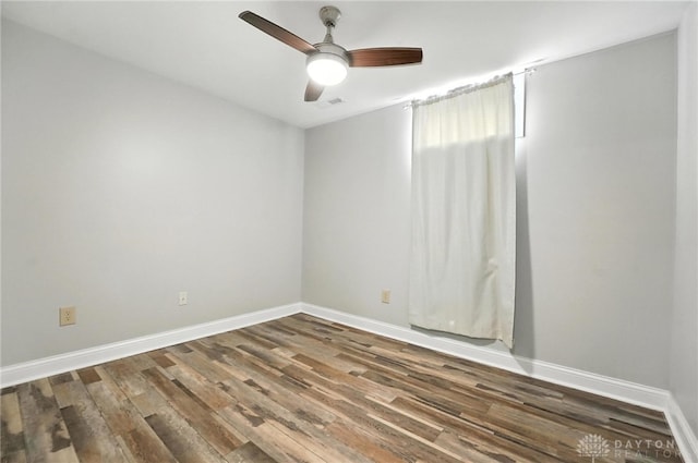 2042 Hilltop Rd, Xenia, OH 45385 - empty room with wood finished floors and a ceiling fan
