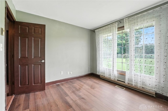 2042 Hilltop Rd, Xenia, OH 45385 - unfurnished room with wood finished floors and baseboards