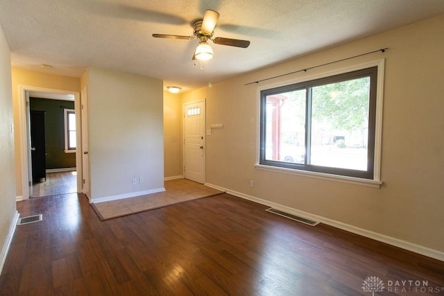 27 Hillview Ave, Miamisburg, OH 45342 - spare room featuring a ceiling fan, wood finished floors, and a textured ceiling