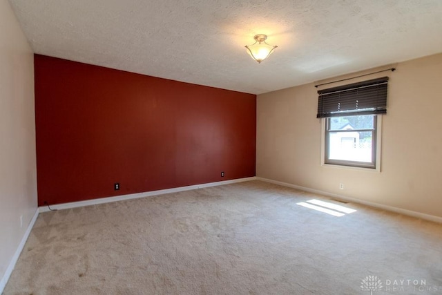27 Hillview Ave, Miamisburg, OH 45342 - spare room with light colored carpet and a textured ceiling