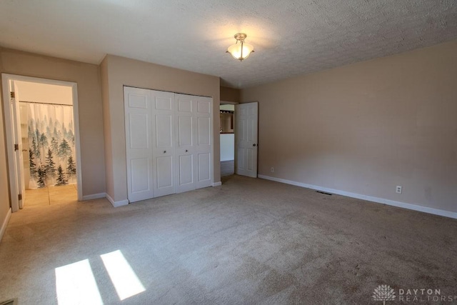 27 Hillview Ave, Miamisburg, OH 45342 - unfurnished bedroom featuring carpet flooring and a closet