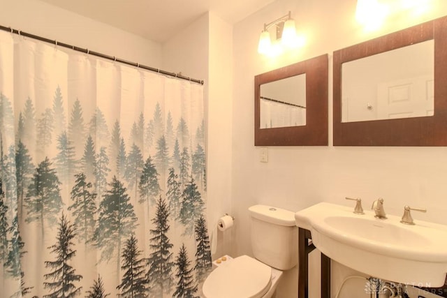 27 Hillview Ave, Miamisburg, OH 45342 - bathroom with toilet and a shower with curtain