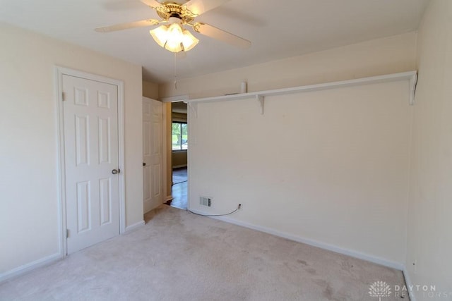 27 Hillview Ave, Miamisburg, OH 45342 - unfurnished bedroom featuring light colored carpet and ceiling fan