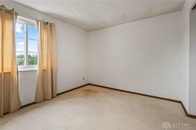 8869 Washington Colony Dr, Dayton, OH 45458 - empty room featuring light carpet