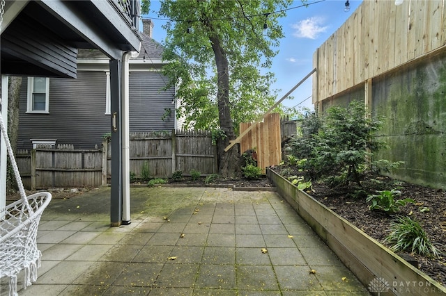38-40 Greenwood Ave, Dayton, OH 45410 - fenced backyard with a patio area