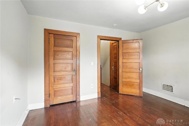 38-40 Greenwood Ave, Dayton, OH 45410 - unfurnished bedroom featuring wood-type flooring and baseboards