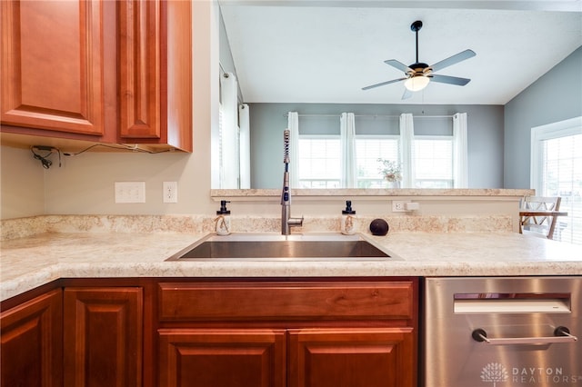 2937 E Ambrosia Ln, Xenia, OH 45385 - kitchen with dishwasher, a ceiling fan, light countertops, and brown cabinets